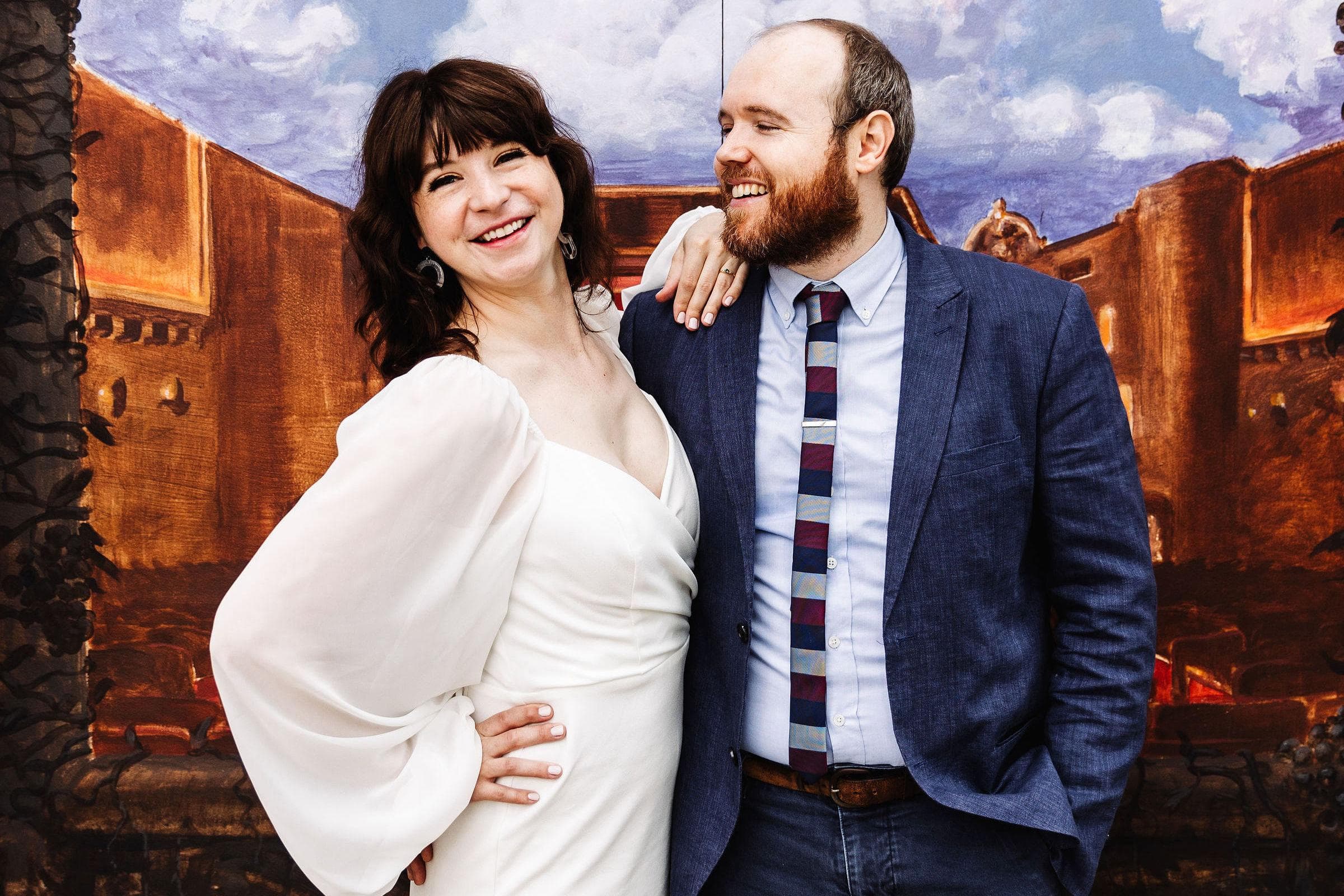 Engagement photo of the couple inside the Music Box Theater